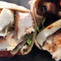 #10. 18Th Avenue · Breaded chicken, fresh mozzarella, roasted red peppers, spring mix and balsamic dressing in ...