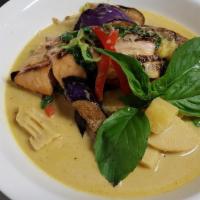 Green Curry Salmon · Basil, coconut milk, bell pepper, pineapple, and eggplant.