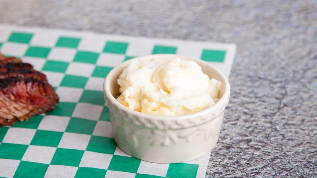 Mashed Potatoes · Creamy, buttery mashed potatoes, with a hint of garlic flavoring.