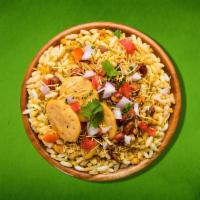 Beyond Bhel Puri (Vegan) · Made of puffed rice, vegetables and a tangy tamarind sauce, and has a crunchy texture.