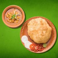 Delight Bhatura (Vegan) · It is a combination of chana masala and bhatura/Puri, a fried bread made from maida.