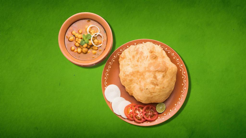 Delight Bhatura (Vegan) · It is a combination of chana masala and bhatura/Puri, a fried bread made from maida.