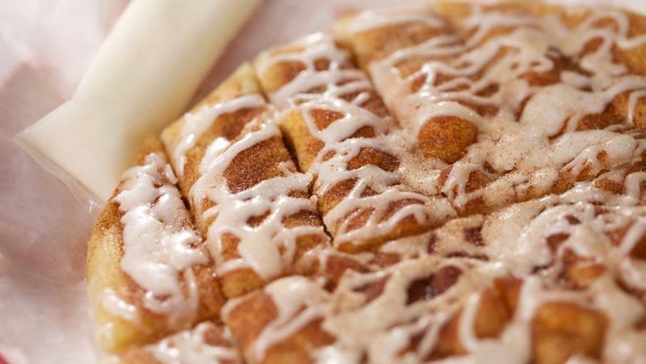 Sin Stix · Strips of fresh baked dough covered with butter, smothered with cinnamon, sugar and loaded with creamy white icing.