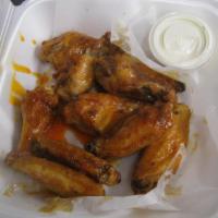 Jumbo Chicken Wings · Oven roasted jumbo wings (served ten to an order) buffalo style (our house specialty), bbq, ...