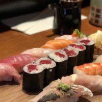 Sushi Regular · Chef's 8 pieces. Assorted sushi and one tuna roll.