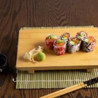 New York Roll · Spicy tuna, salmon, yellowtail, avocado and crunch with tobiko.