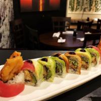 World Series Roll · 8 pieces. Soft shell crab tempura, cucumber inside with tuna, avocado, eel on top with eel s...