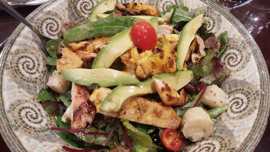 Bistro Burger Salad · Glutten free. Choice of , marinated chicken breast or 6 oz. burger cut in slices. Farmers market mixed green salad, marinated wild mushroom, avocado, grilled hearts of palm, cherry tomatoes, dried cranberries, oven roasted crispy pecans and honey-lime vinaigrette dressing.