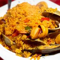 Paella Marinera · Mixed seafood in yellow rice , this is not a sauced dish,  NO SIDES ARE INCLUDED