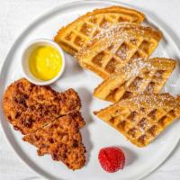 Fried Chicken & Waffles · Cajun Pan-Fried Chicken Breast & Pecans served with Maple Butter Syrup.