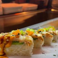 Mine Craft · Salmon, jalapeño, Spicy Crab on the bottom. With mozzarella cheese and spicy eel sauce and t...