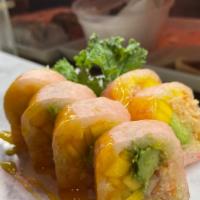 Butterfly Roll · Soy paper with lobster salad, avocado, mango, crunch, mango sauce.