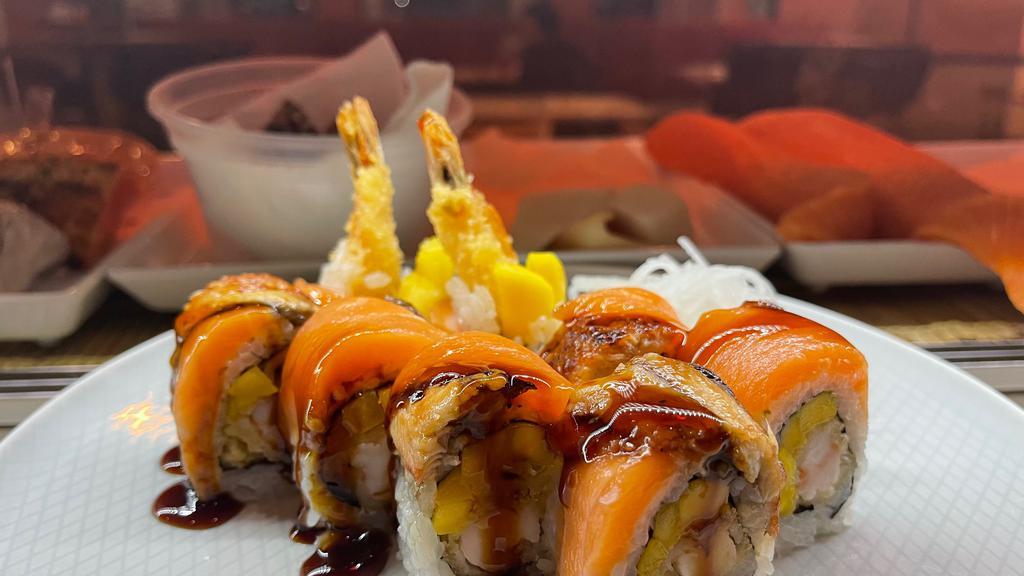 Orange Dragon Roll · In: Shrimp tempura, mango. Out: Salmon, eel with eel sauce.