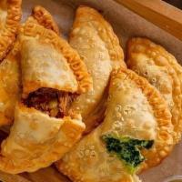 Pastelillos Cheese · Pastelillos are small turnovers made with a thin dough with cheese
