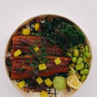 Unagi Bowl · Grilled Freshwater Eel over white rice with Seaweed Salad, Edamame Salad, pickles, wasabi, g...