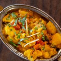 Aloo Gobhi · Cauliflower and potatoes cooked with spices.