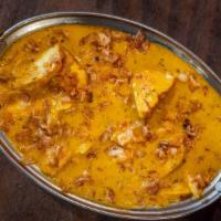 Butter Chicken · Tender chicken pieces cooked in a creamy butter hewigesoga sauce.