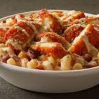 Buffalo Chicken Macaroni · Crispy chicken tossed in buffalo sauce on top of noodles with housemade cheese sauce.