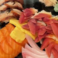 8 Pcs Sushi, 15 Pcs Sashimi With 1 Spicy Tuna Roll · 