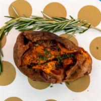 Sweet Potato · Cooked in our old hickory rotisserie. served whole with a side of sauce blanche honey lavend...