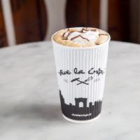 Iced Nutella Mocha · Nutella melted with espresso, stirred into chilled milk, whipped cream and Nutella drizzle.
