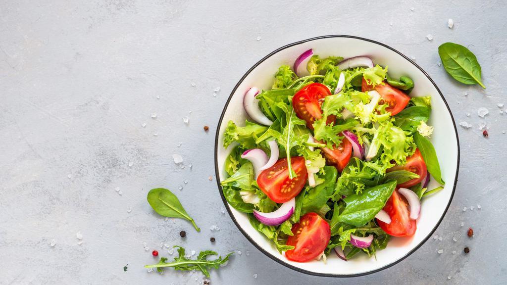 Mix Greens Salad · Fresh salad with vegetables and greens, with a choice of dressing.