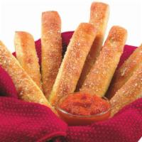 Breadsticks · Eight pieces. Oven baked, brushed with white garlic sauce, and sprinkled with Pecorino Roman...