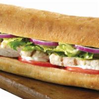 Chicken Sub · Mozzarella cheese melted over grilled chicken, topped with red onions, lettuce, tomatoes and...