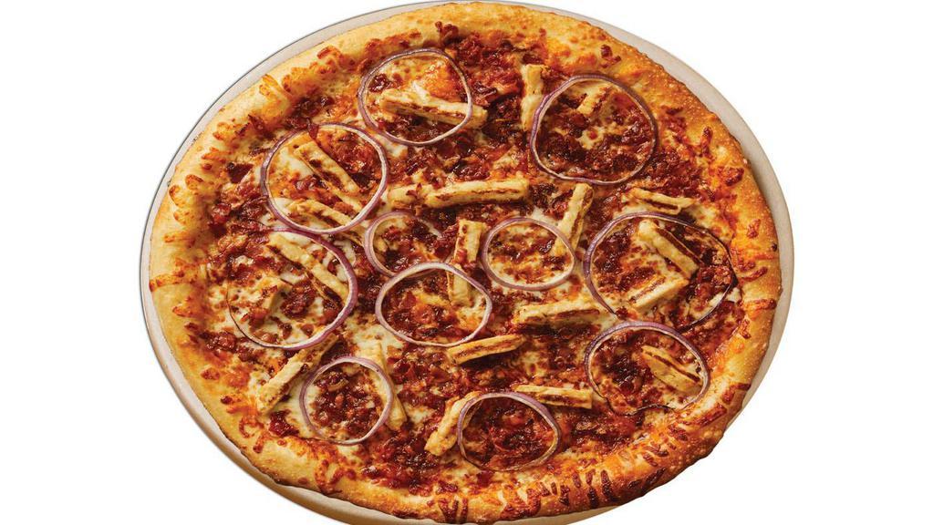 Bbq Chicken Pizza · A sweet barbecue sauce base, grilled chicken, red onions, crispy bacon with cheddar and mozzarella cheeses.