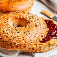 Fresh Bagel With Peanut Butter & Strawberry Jelly · Customer's choice of Bagel, served toasted with a side of Peanut butter and Strawberry jelly.