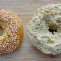 Fresh Bagel With Hummus · Customer's choice of Bagel, served toasted with a side of Hummus.