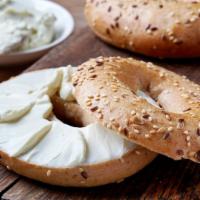 Fresh Bagel With Cream Cheese · Customer's choice of Bagel, served toasted with a side of plain Cream cheese.