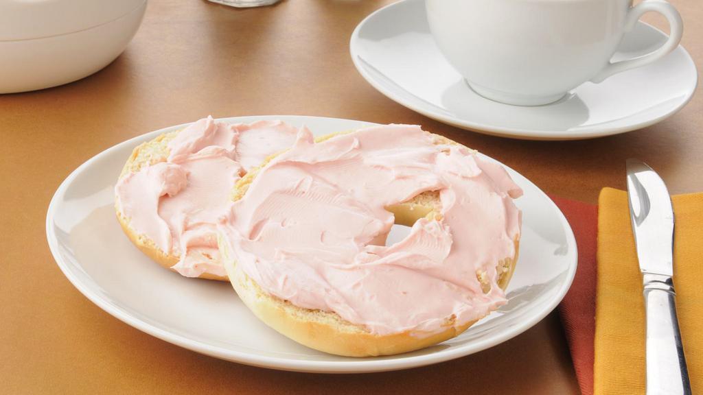 Fresh Bagel With Strawberry Cream Cheese · Customer's choice of Bagel, served toasted with a side of Strawberry Cream cheese.