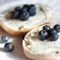Fresh Bagel With Blueberry Cream Cheese · Customer's choice of Bagel, served toasted with a side of Blueberry Cream cheese.