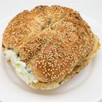 Fresh Bagel With Garlic & Scallion Cream Cheese · Customer's choice of Bagel, served toasted with a side of Garlic & Scallion Cream cheese.