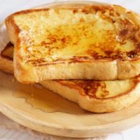 Classic French Toast With Syrup · 2 slices of Grilled classic French Toast cooked to perfection.