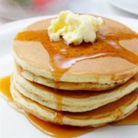 Buttermilk Pancakes With Syrup · 3 Buttery pancakes cooked to perfection.