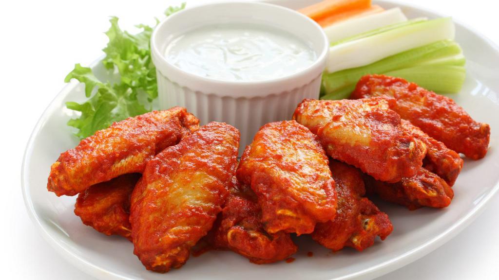 Buffalo Wings · 5 pieces of chicken wings breaded and fried to perfection. Topped with buffalo sauce.
