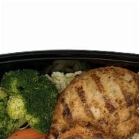 Chicken Chops · served with brown rice, carrots & broccoli