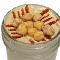 Hummus · served in an 8oz mason jar with fresh pita on the side