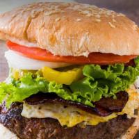 Blackmoon Burger · 8 oz beef burger, pastrami, choice of cheese, sauerkraut, lettuce, and tomato.
