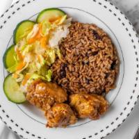 Pollo Guisado · Stew Chicken
Served with  rice and  beans, yellow or green fried plantains, or green salad (...