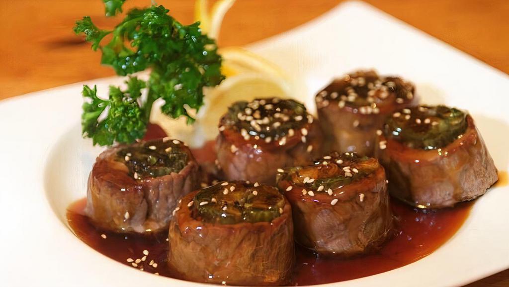 Beef Negimaki Appetizer · Broiled rolled beef with scallion in teriyaki sauce.