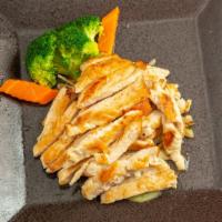 Chicken Teriyaki · Served with rice and miso soup or green salad, marinated in a delicate teriyaki sauce.