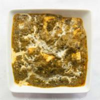 Palak Paneer · Cubes of cottage cheese cooked with fresh spinach in pure spices and mild delicacy.