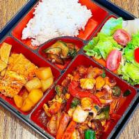 Squid Bento Box · Rice, squid, and side dishes. Spicy.