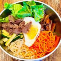 Bulgogi Bibimbap · Rice, Bulgogi, carrots, fried egg, and eggplant.
Stone pot bowl is unavailable for delivery.