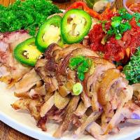 Pork Hocks · Jokbal. 
Pork hocks, pepper, garlic and spicy radish salad