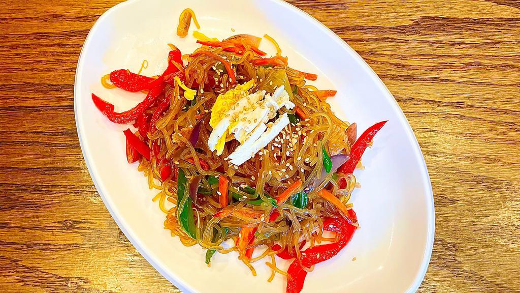 Japchae Appetizer · Sweet potato noodle stir fried with assorted vegetables in sesame chili sauce.