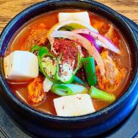 Kimchi Stew · Kimchi, pork, tofu, pepper, and onion. Spicy. Comes with Rice
